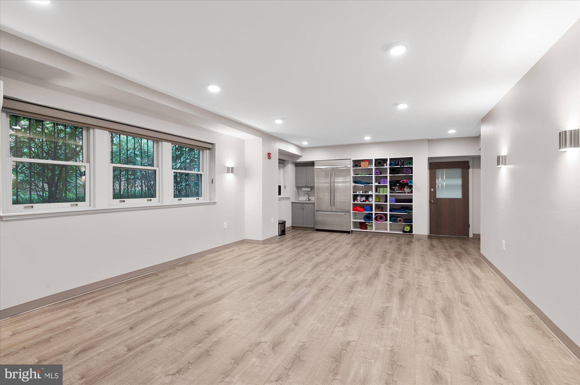 2101 Connecticut Avenue Northwest, Unit A Washington, DC 20009 - Photo 24 of 34 a view of empty room with wooden floor and window