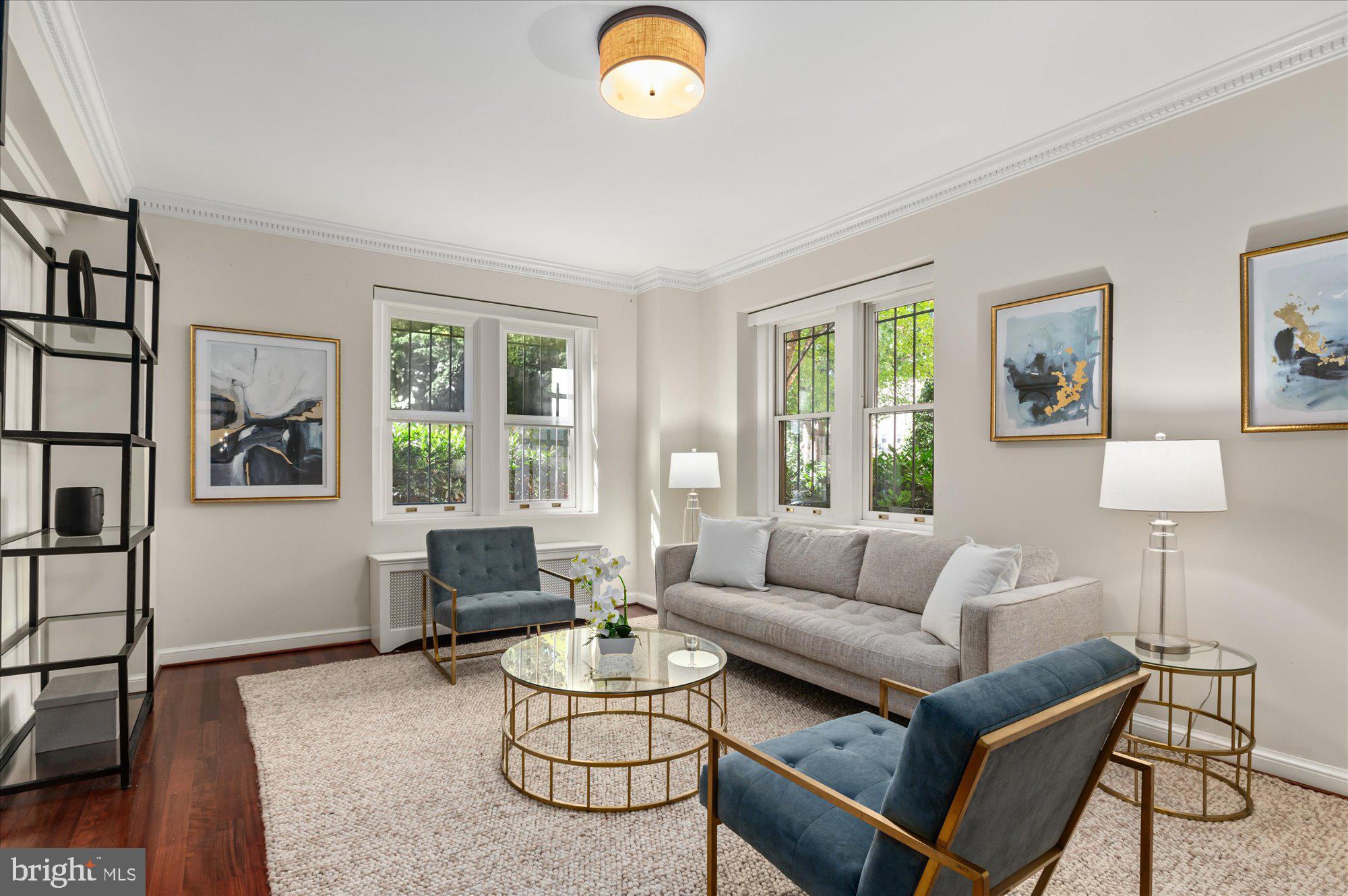 2101 Connecticut Avenue Northwest, Unit A Washington, DC 20009 - Photo 2 of 34 a living room with furniture and a window