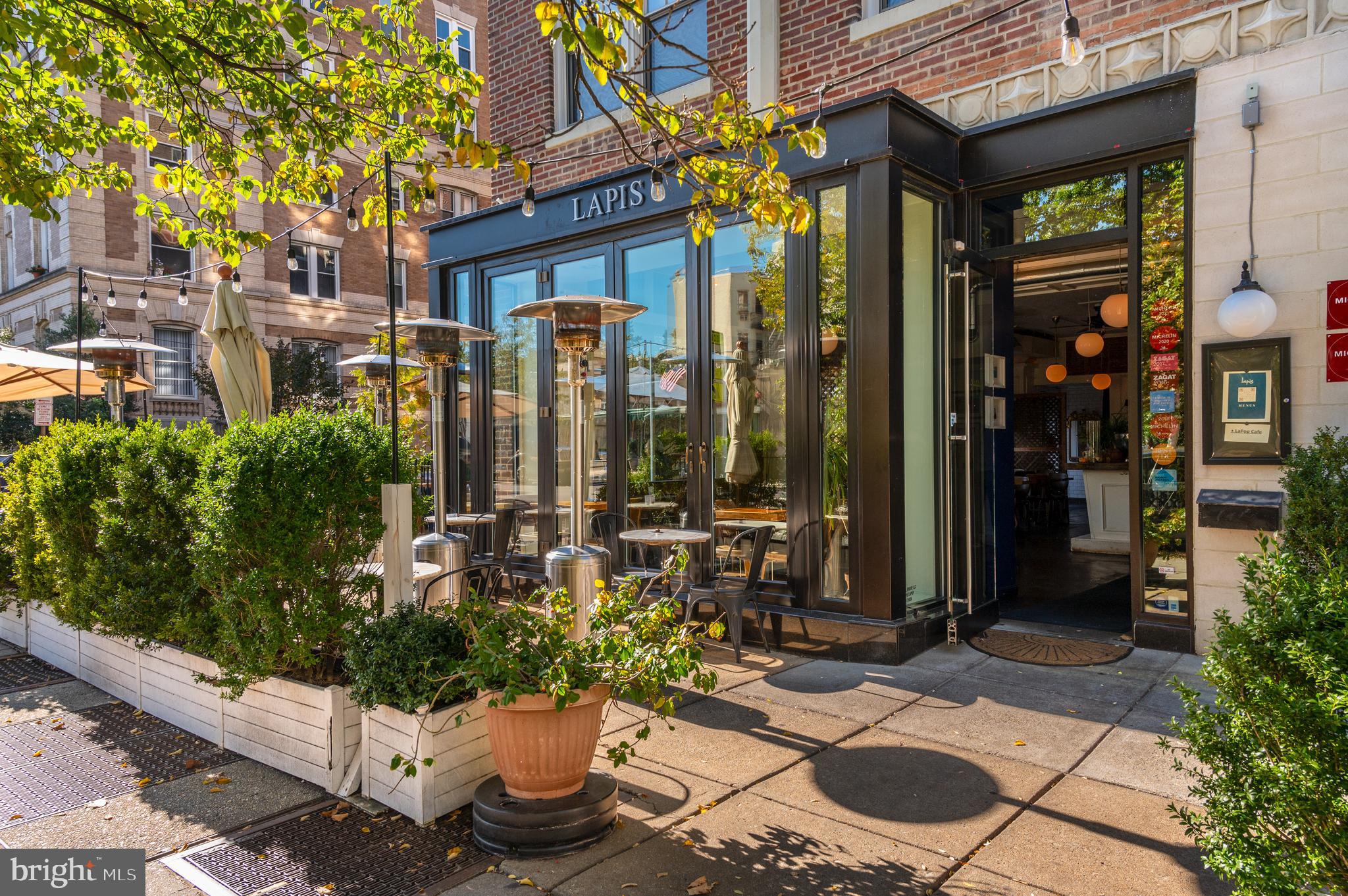 2101 Connecticut Avenue Northwest, Unit A Washington, DC 20009 - Photo 30 of 34 a view of a chairs and table in a backyard