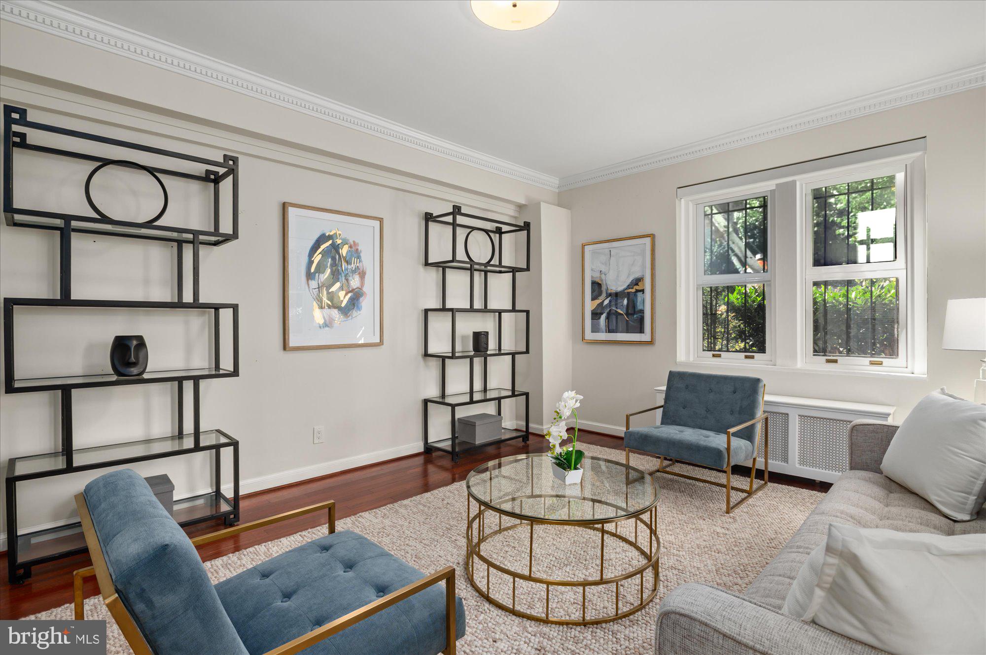 2101 Connecticut Avenue Northwest, Unit A Washington, DC 20009 - Photo 3 of 34 a living room with furniture a rug and a window