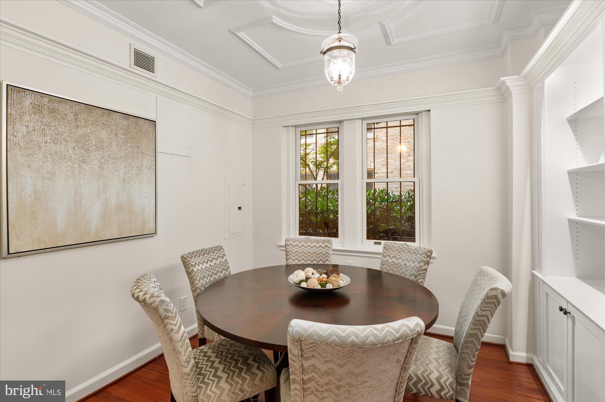 2101 Connecticut Avenue Northwest, Unit A Washington, DC 20009 - Photo 4 of 34 a living room with furniture and a large window