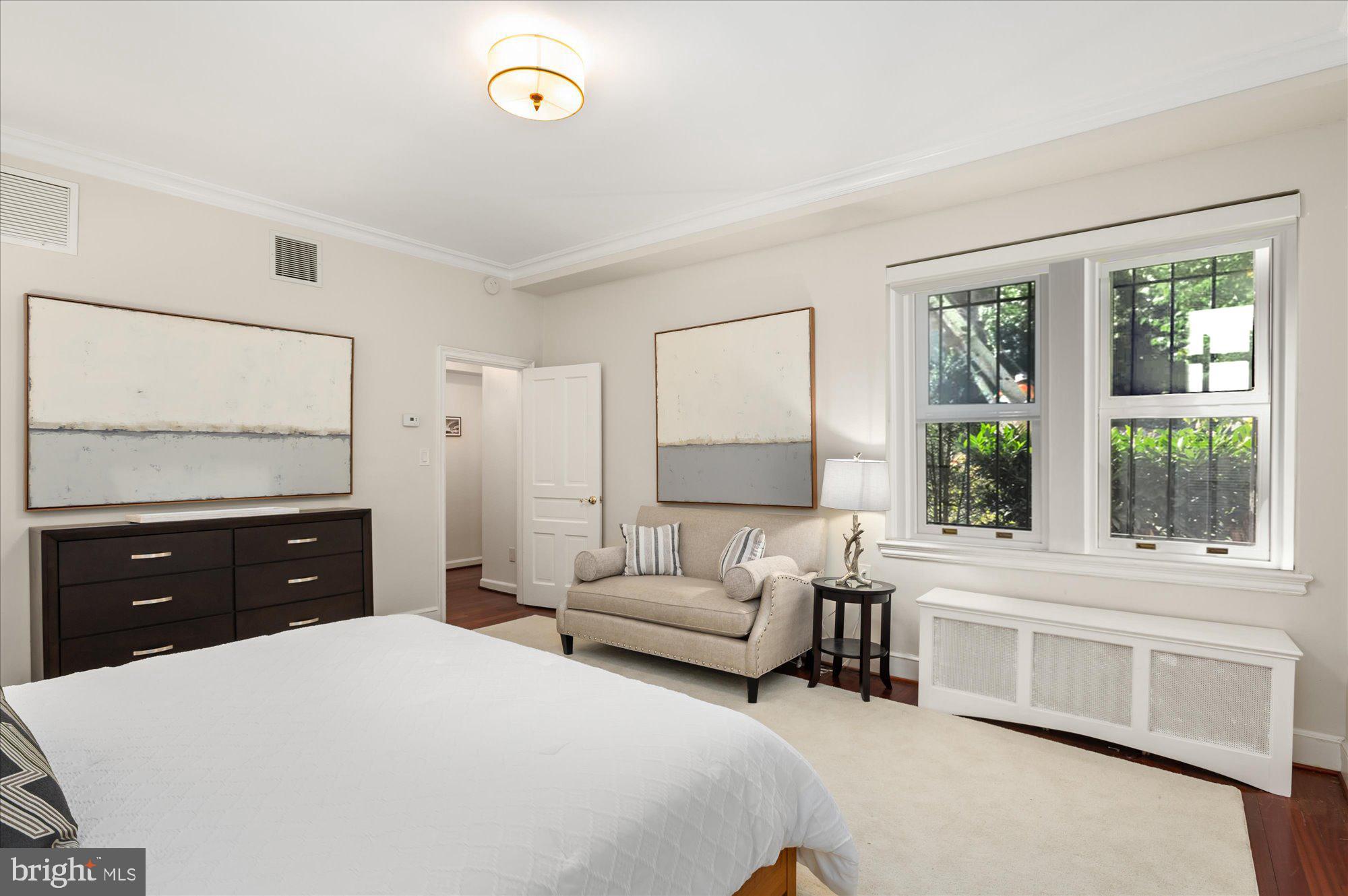 2101 Connecticut Avenue Northwest, Unit A Washington, DC 20009 - Photo 8 of 34 a living room with furniture and a window