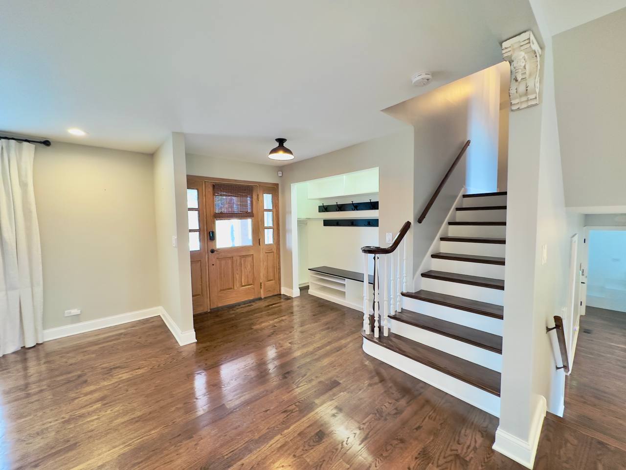 6140 Ruby Street Rosemont, IL 60018 - Photo 12 of 35 a view of entryway and hall with wooden floor