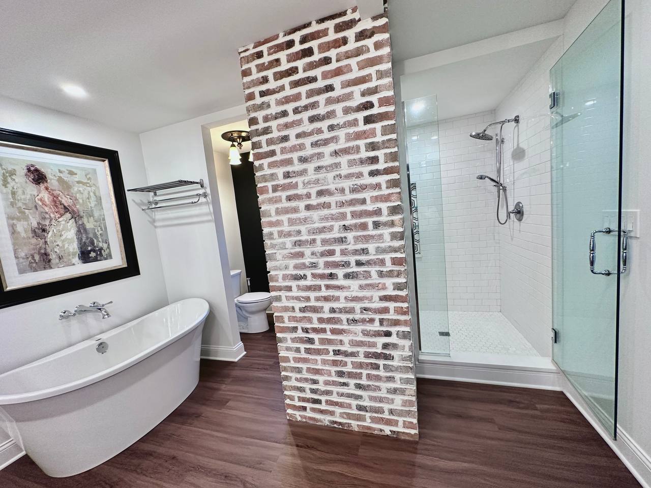 6140 Ruby Street Rosemont, IL 60018 - Photo 17 of 35 a bathroom with a bathtub and a shower