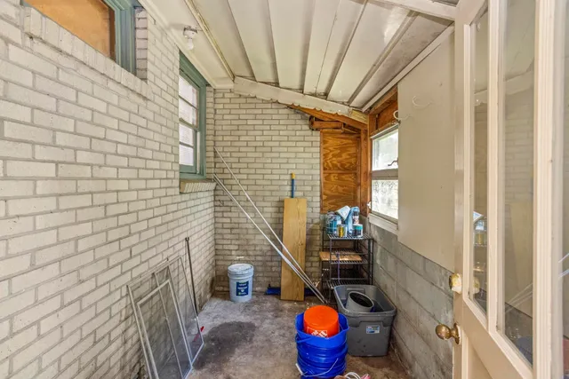 a bathroom with a sink and a shower curtain