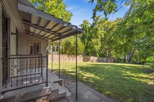 a view of a backyard with a garden