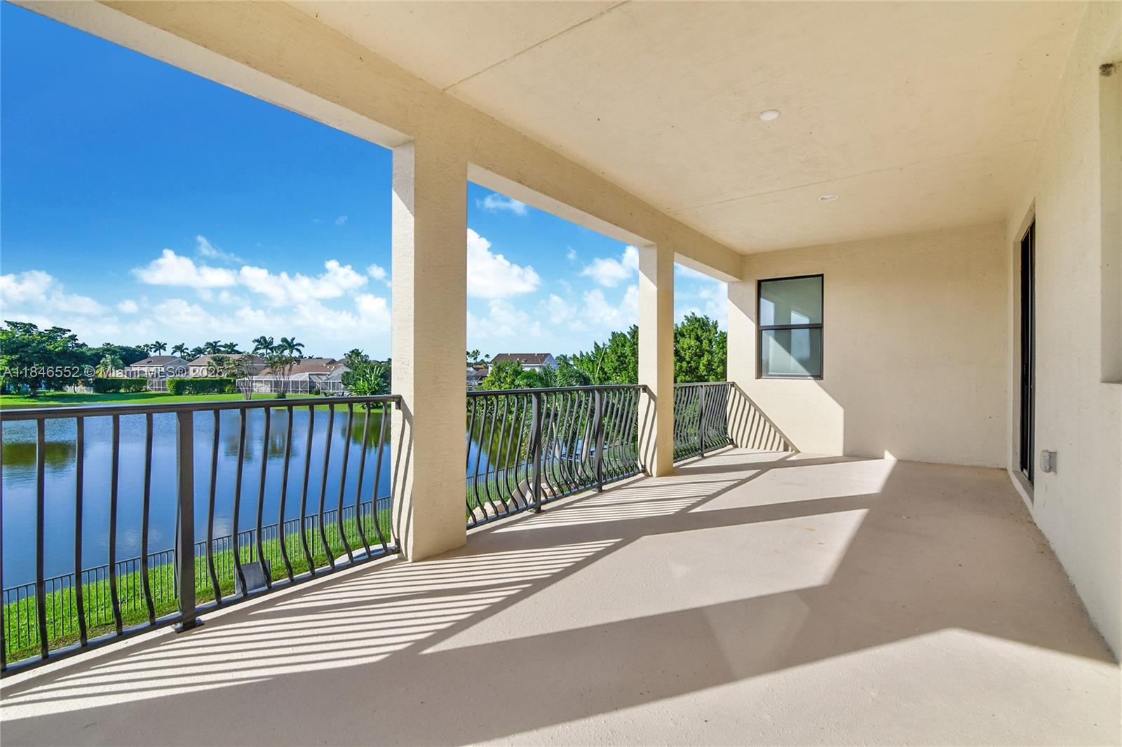 12137 Boca Reserve Lane Boca Raton, FL 33428 - Photo 12 of 35 a balcony with view of lake view