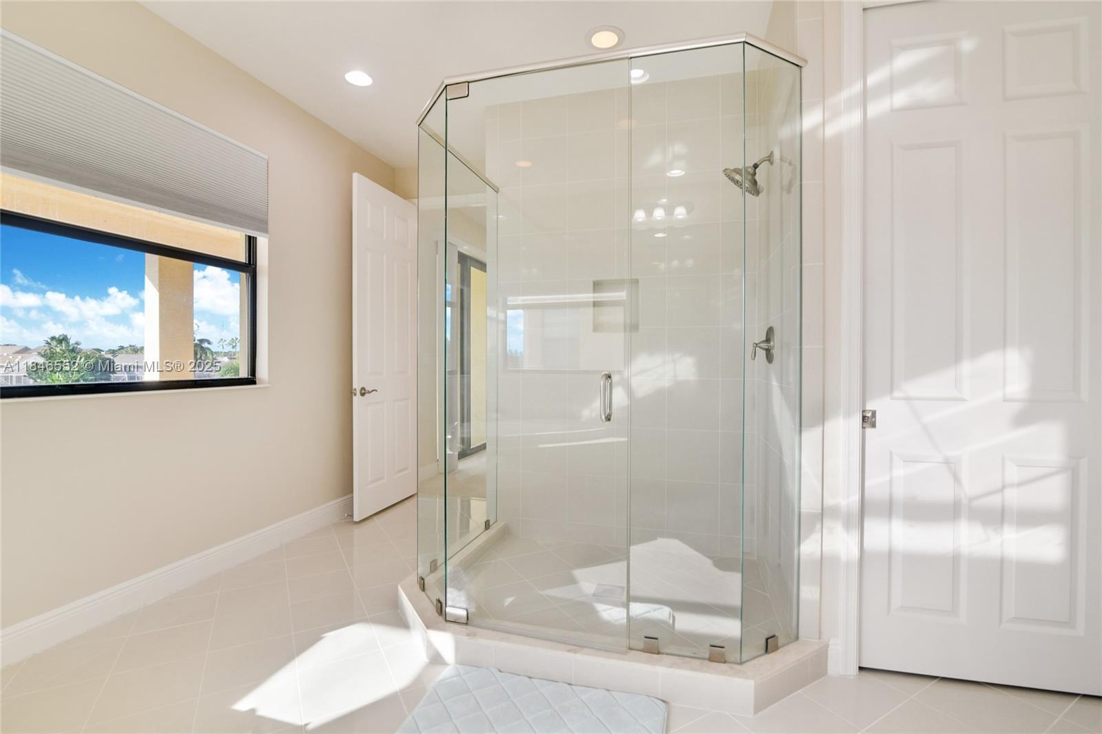 12137 Boca Reserve Lane Boca Raton, FL 33428 - Photo 18 of 35 a bathroom with a shower