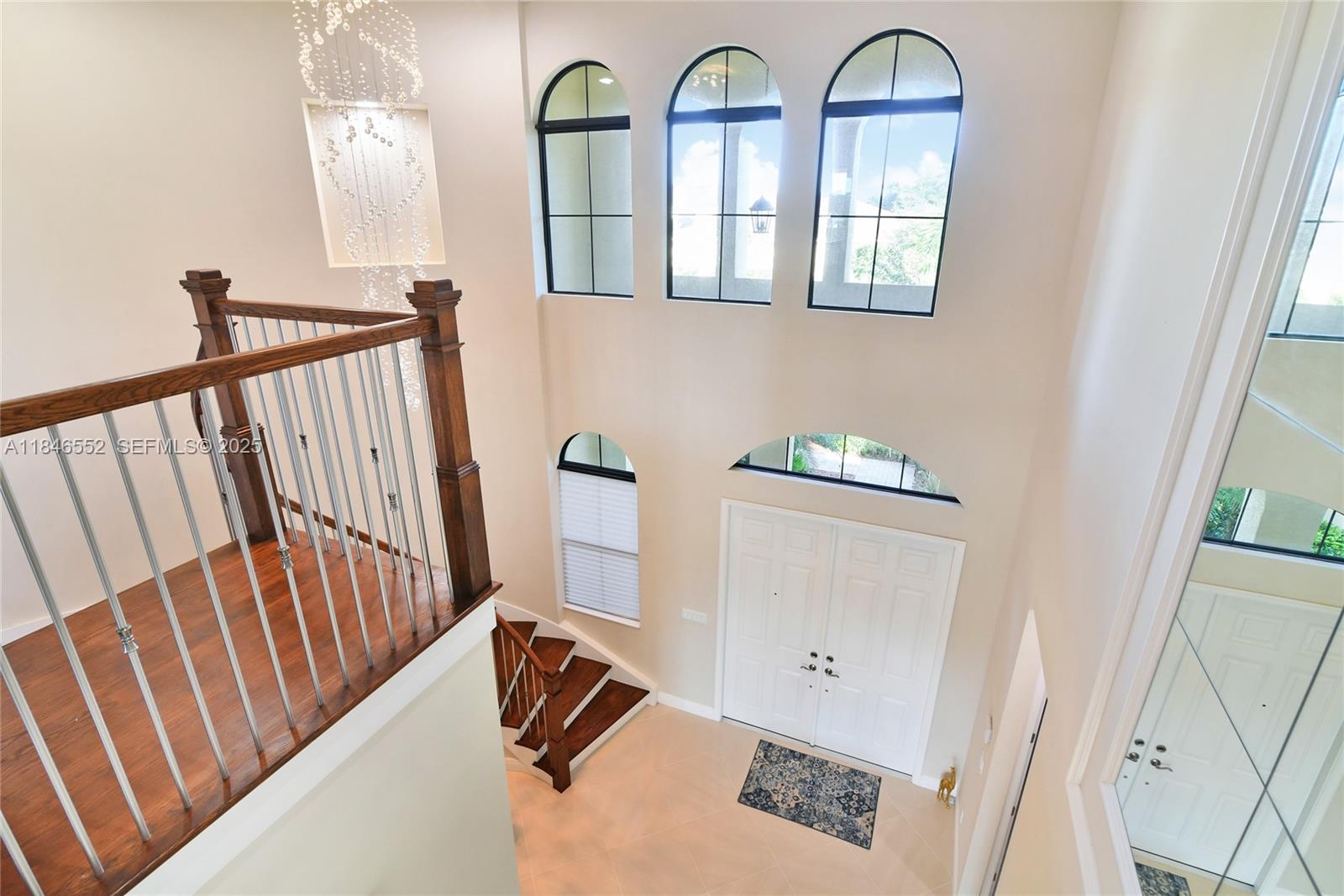 12137 Boca Reserve Lane Boca Raton, FL 33428 - Photo 24 of 35 a view of front door with hallway