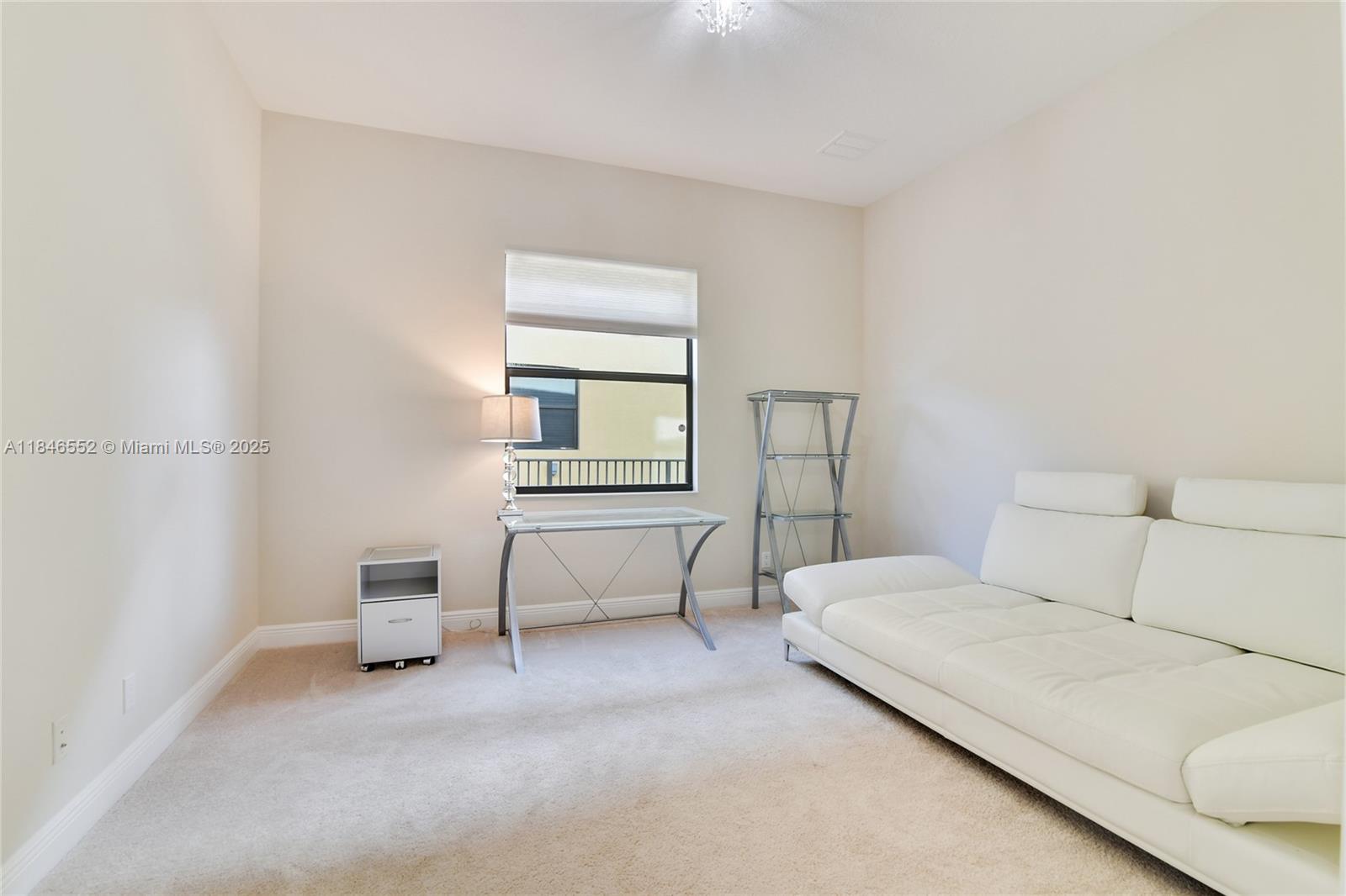 12137 Boca Reserve Lane Boca Raton, FL 33428 - Photo 27 of 35 a bedroom with a bed and a lamp