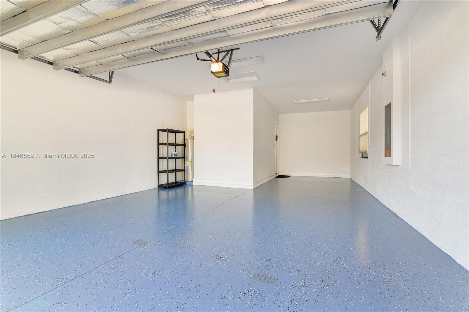 12137 Boca Reserve Lane Boca Raton, FL 33428 - Photo 33 of 35 en empty room with wooden floor and windows