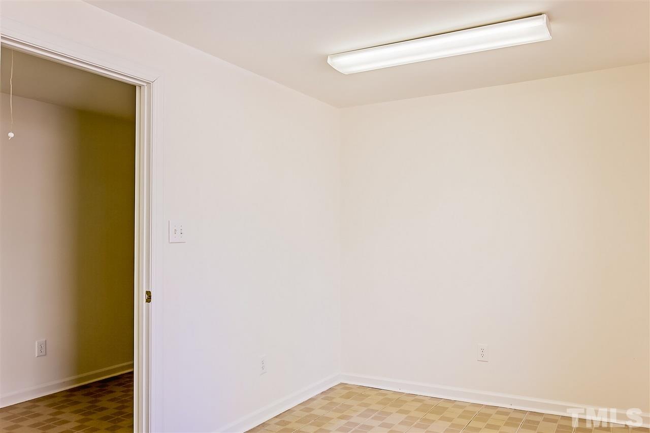 404 Shetland Road Rougemont, NC 27572 - Photo 22 of 25 a view of small space with racks on the wall