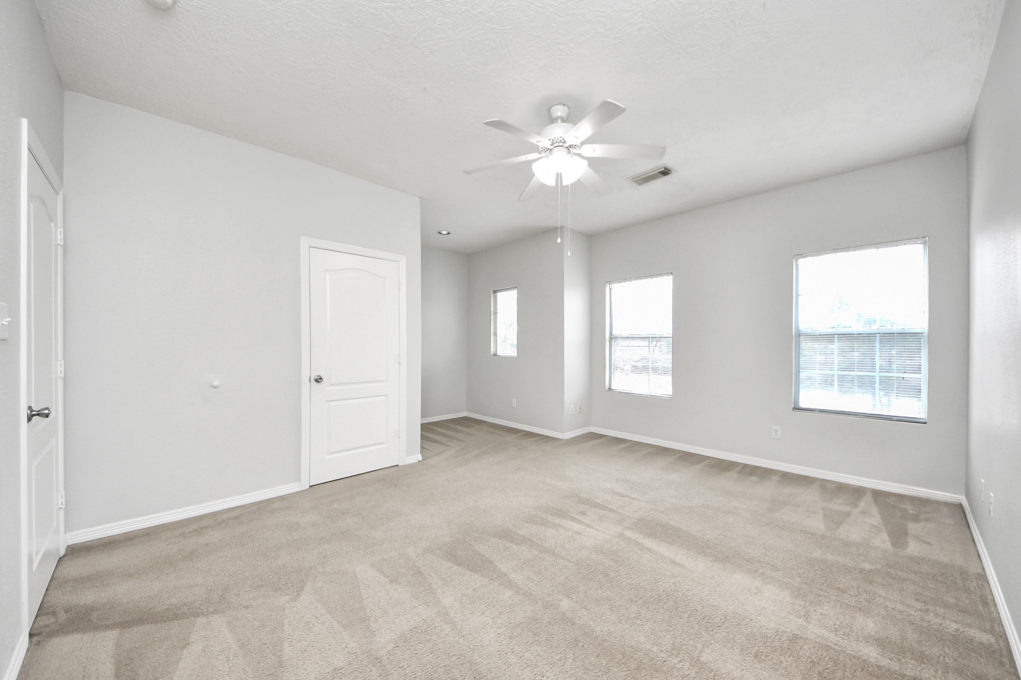 21940 Rayford Road, Unit B Humble, TX 77338 - Photo 20 of 38 a view of an empty room with a window