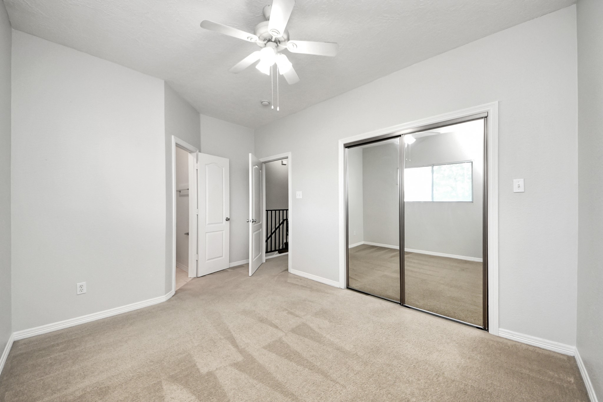 21940 Rayford Road, Unit B Humble, TX 77338 - Photo 24 of 38 a view of an empty room with a window