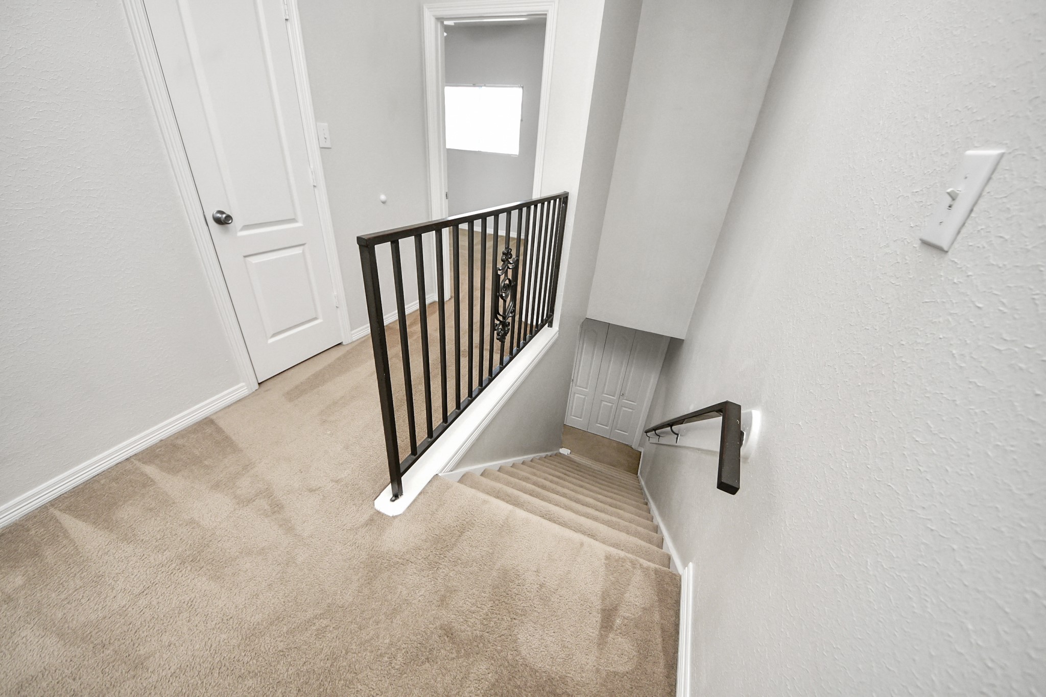 21940 Rayford Road, Unit B Humble, TX 77338 - Photo 29 of 38 a view of a hallway with a white door