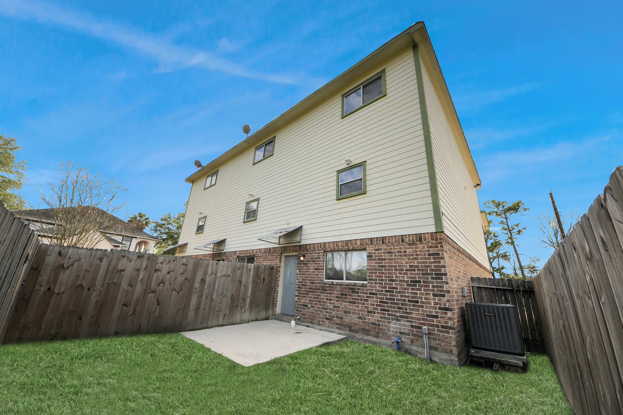 21940 Rayford Road, Unit B Humble, TX 77338 - Photo 36 of 38 a view of a backyard with a garden