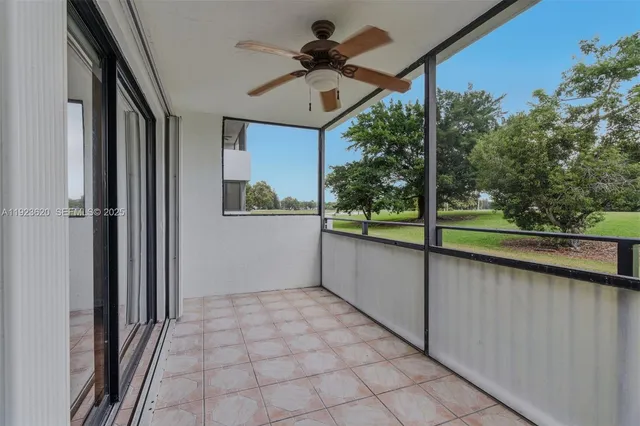 a view of a balcony with a flat screen tv