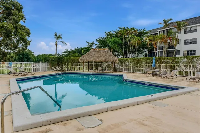 a view of swimming pool from a balcony