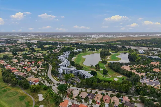 a view of city with ocean