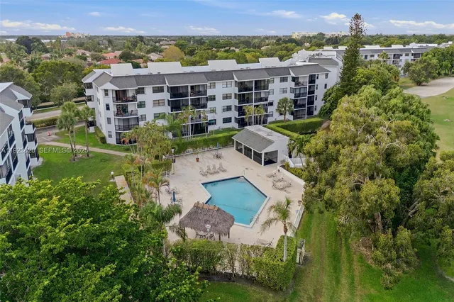 a view of a lake with a yard