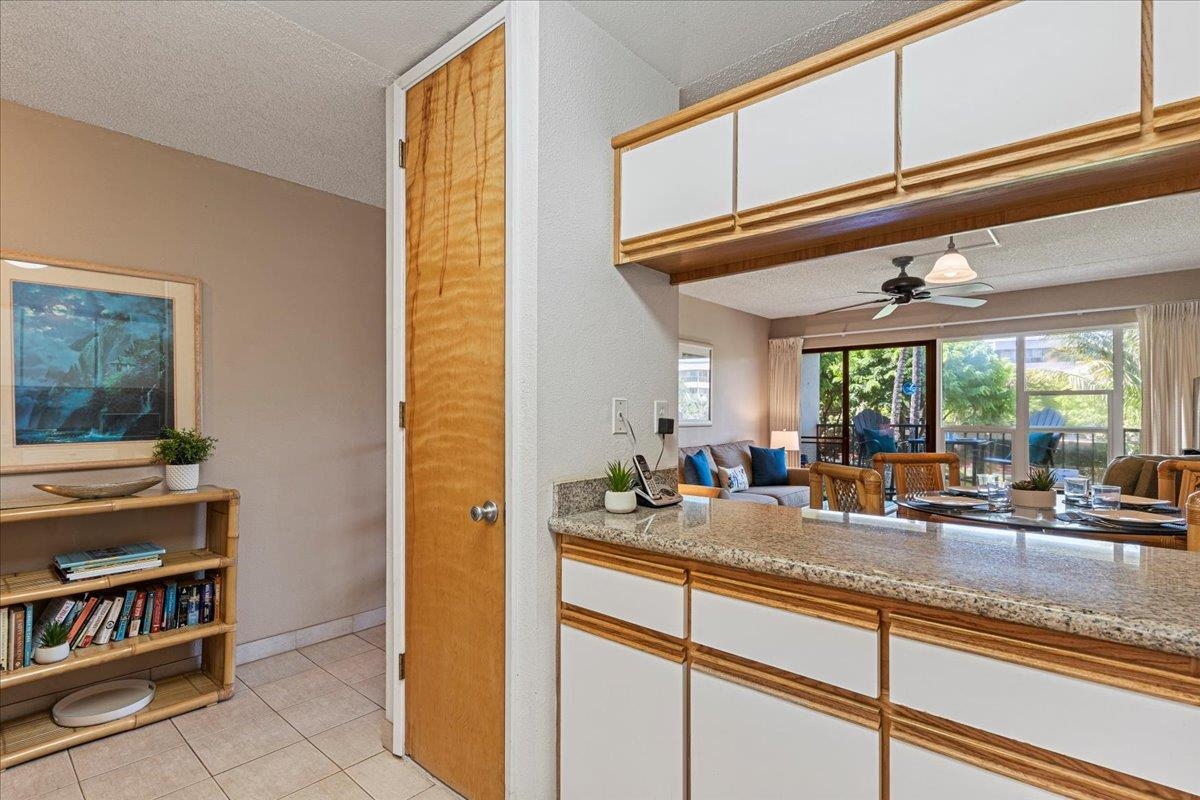 2531 South Kihei Road, Unit C317 Kihei, HI 96753 - Photo 17 of 32 a kitchen with sink and large window
