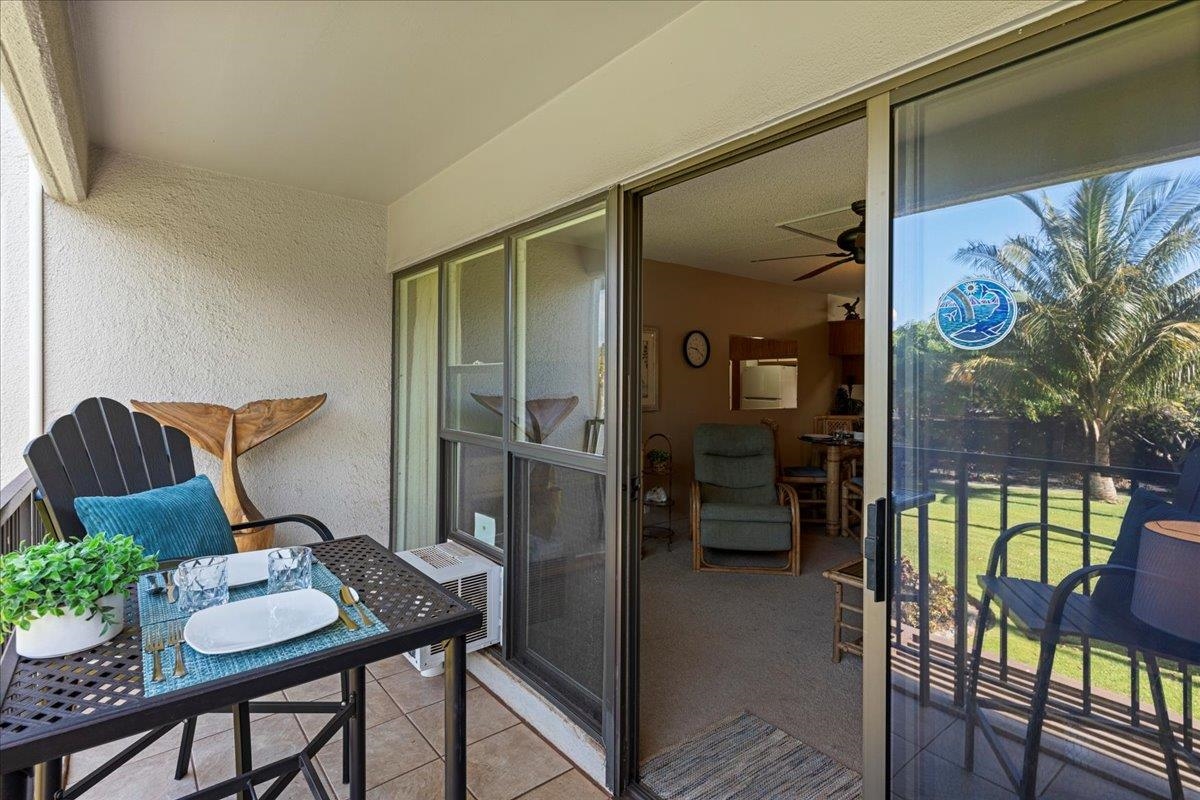 2531 South Kihei Road, Unit C317 Kihei, HI 96753 - Photo 21 of 32 a balcony with furniture and a potted plant