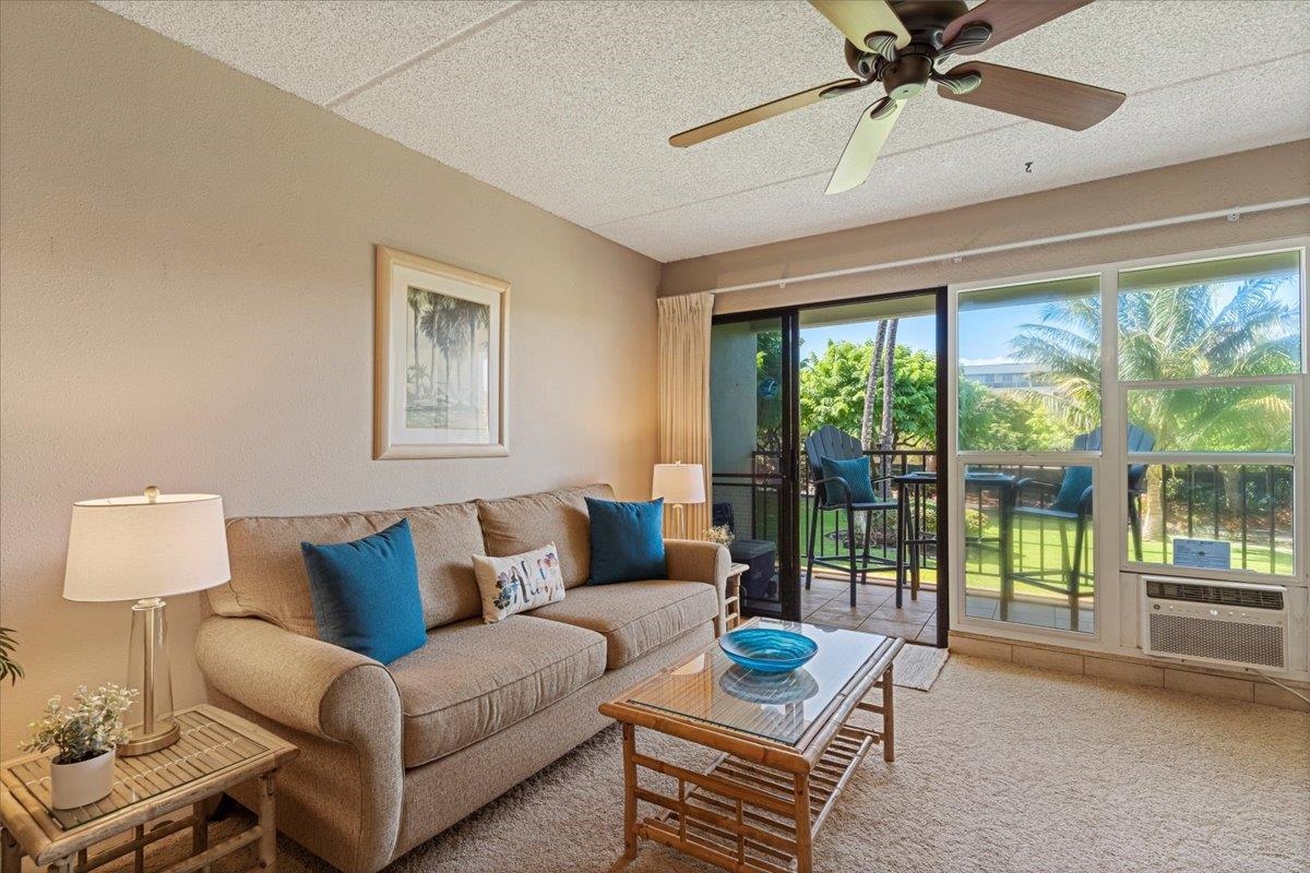 2531 South Kihei Road, Unit C317 Kihei, HI 96753 - Photo 6 of 32 a living room with furniture and a window