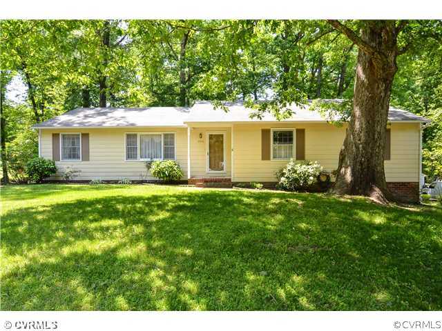 a view of a house with a garden