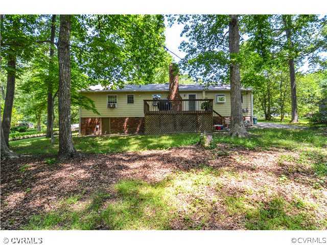 3920 Huntwood Road Richmond, VA 23235 - Photo 19 of 20 a front view of a house with garden