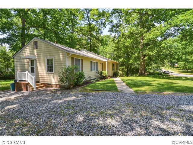 3920 Huntwood Road Richmond, VA 23235 - Photo 2 of 20 a view of a house with a yard