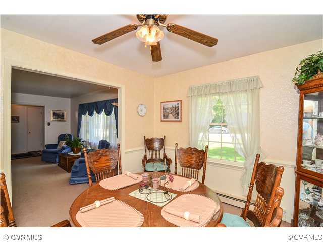 3920 Huntwood Road Richmond, VA 23235 - Photo 4 of 20 a living room with furniture and a large window