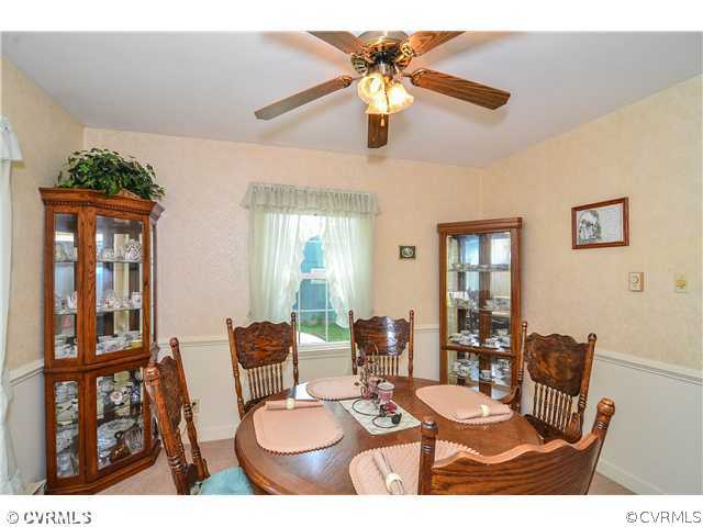 3920 Huntwood Road Richmond, VA 23235 - Photo 5 of 20 a dining room with furniture and window