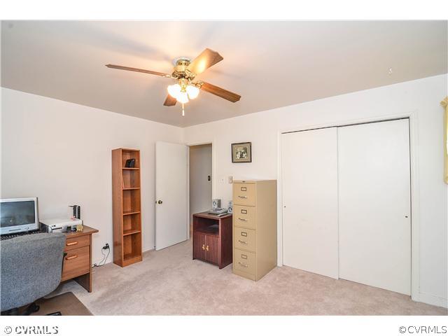 3920 Huntwood Road Richmond, VA 23235 - Photo 10 of 20 a living room with furniture and kitchen view
