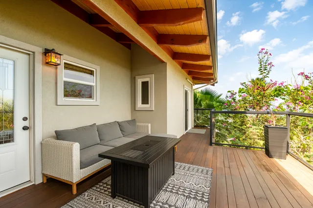 a living room with furniture and a table