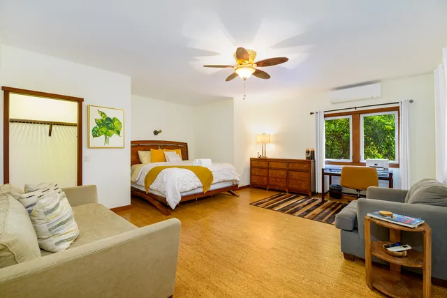 a view of a large building with a yard