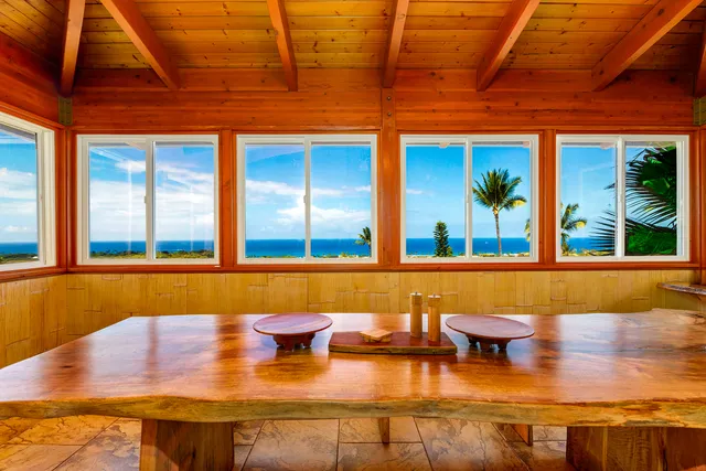 a view of a patio with swimming pool table and chairs