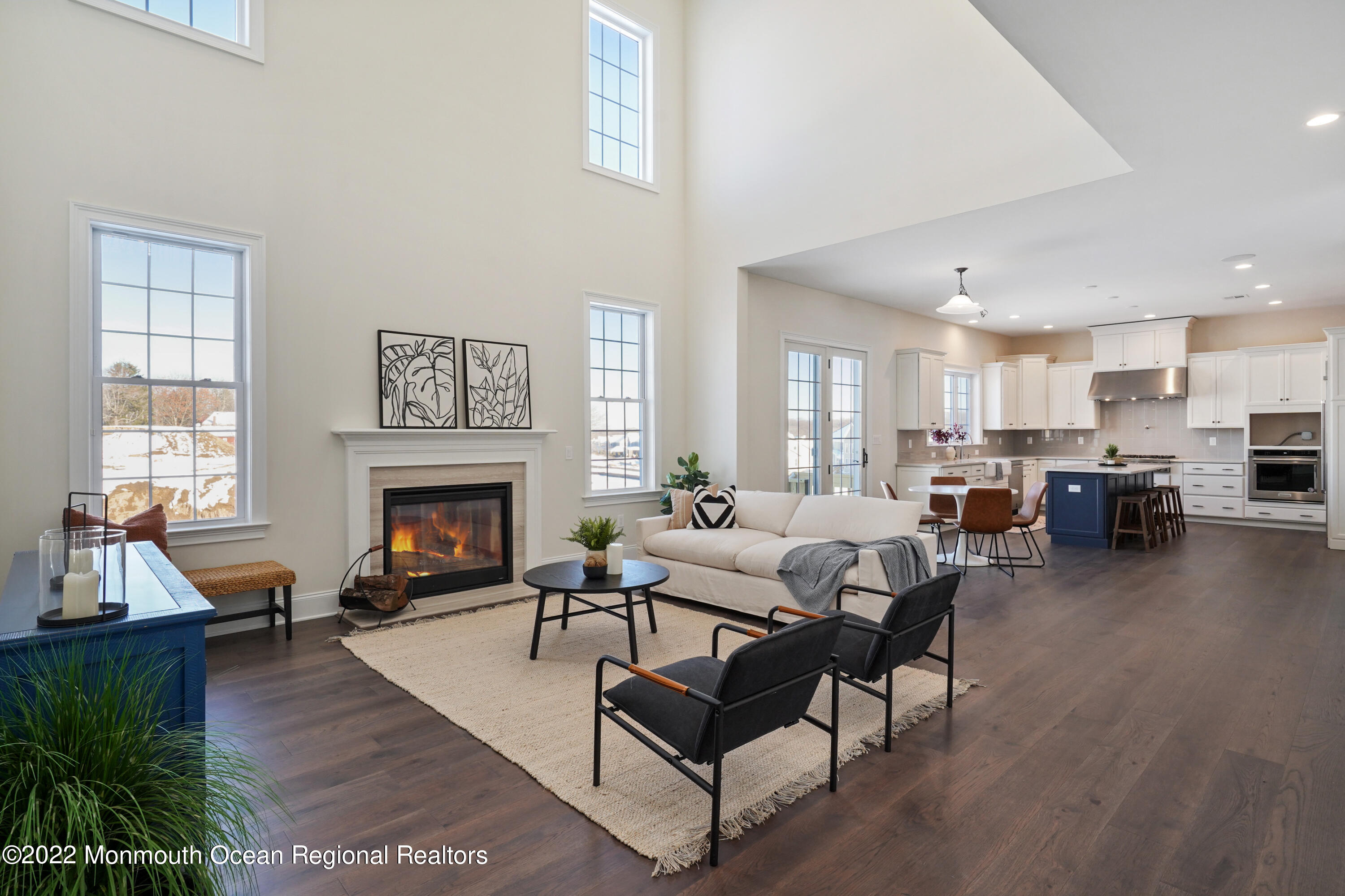 66 Windermere Road Lincroft, NJ 07738 - Photo 13 of 61 a living room with furniture and a fireplace