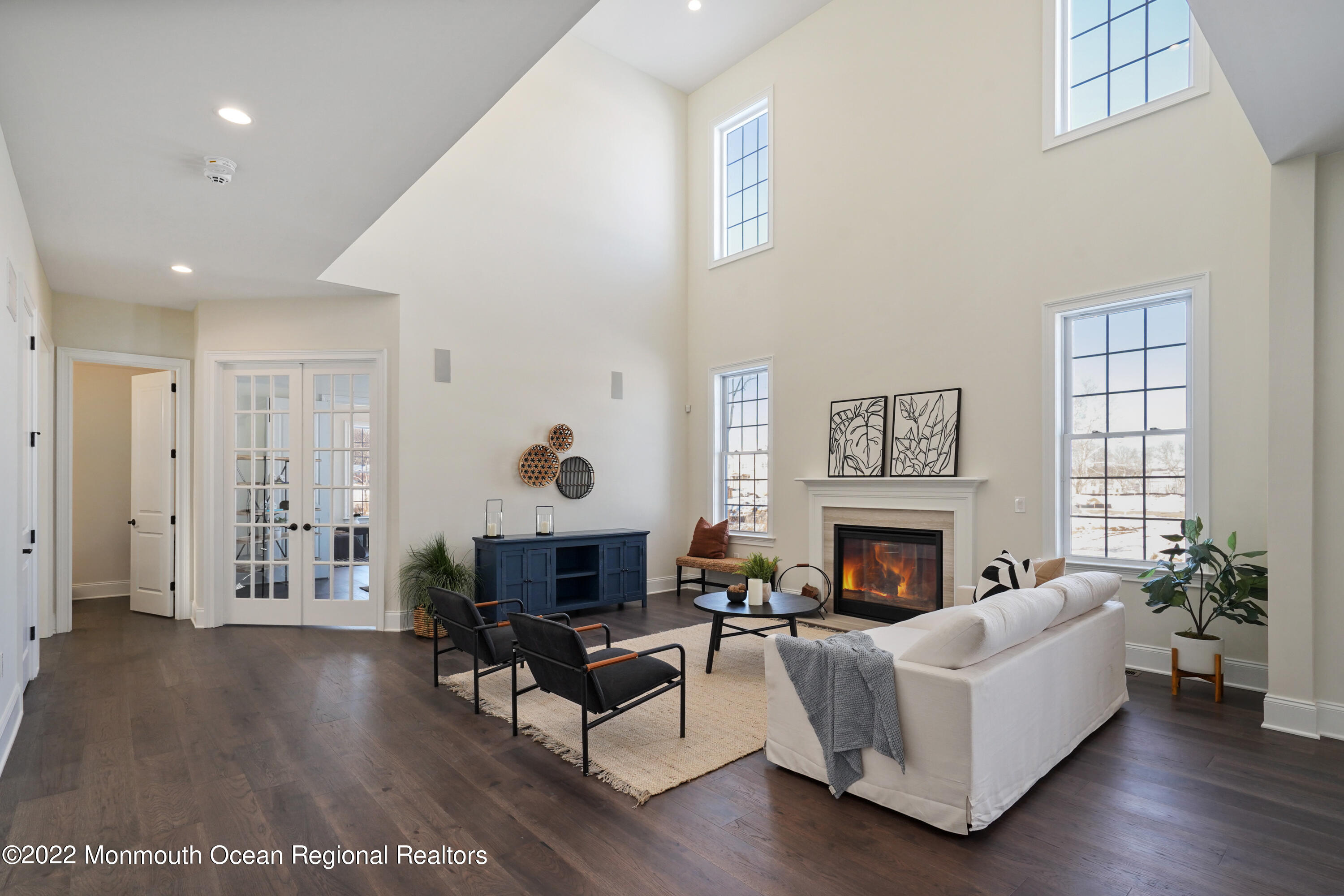 66 Windermere Road Lincroft, NJ 07738 - Photo 15 of 61 a living room with furniture fireplace and wooden floor