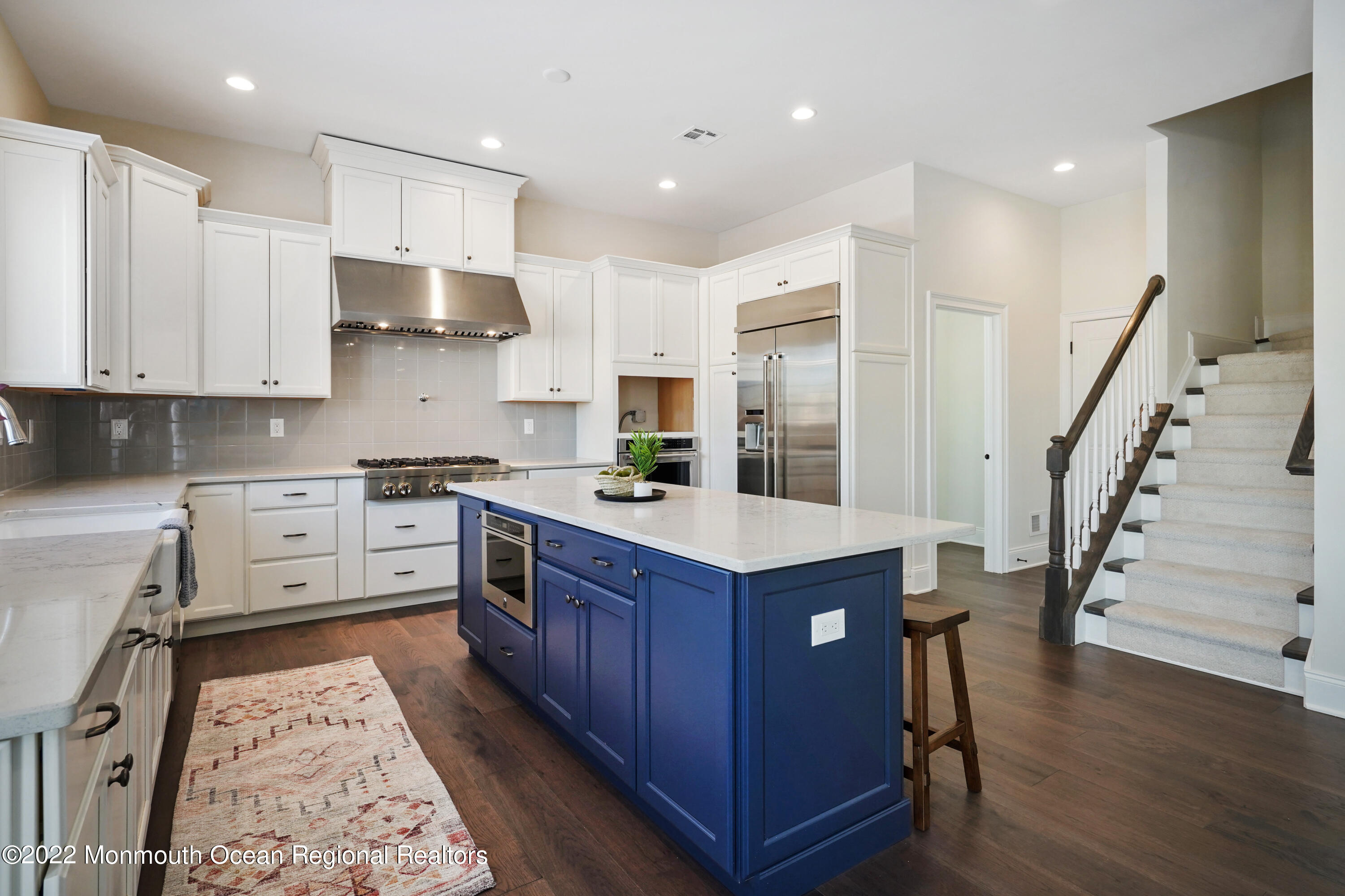 66 Windermere Road Lincroft, NJ 07738 - Photo 18 of 61 a kitchen with stainless steel appliances kitchen island granite countertop a stove and a sink
