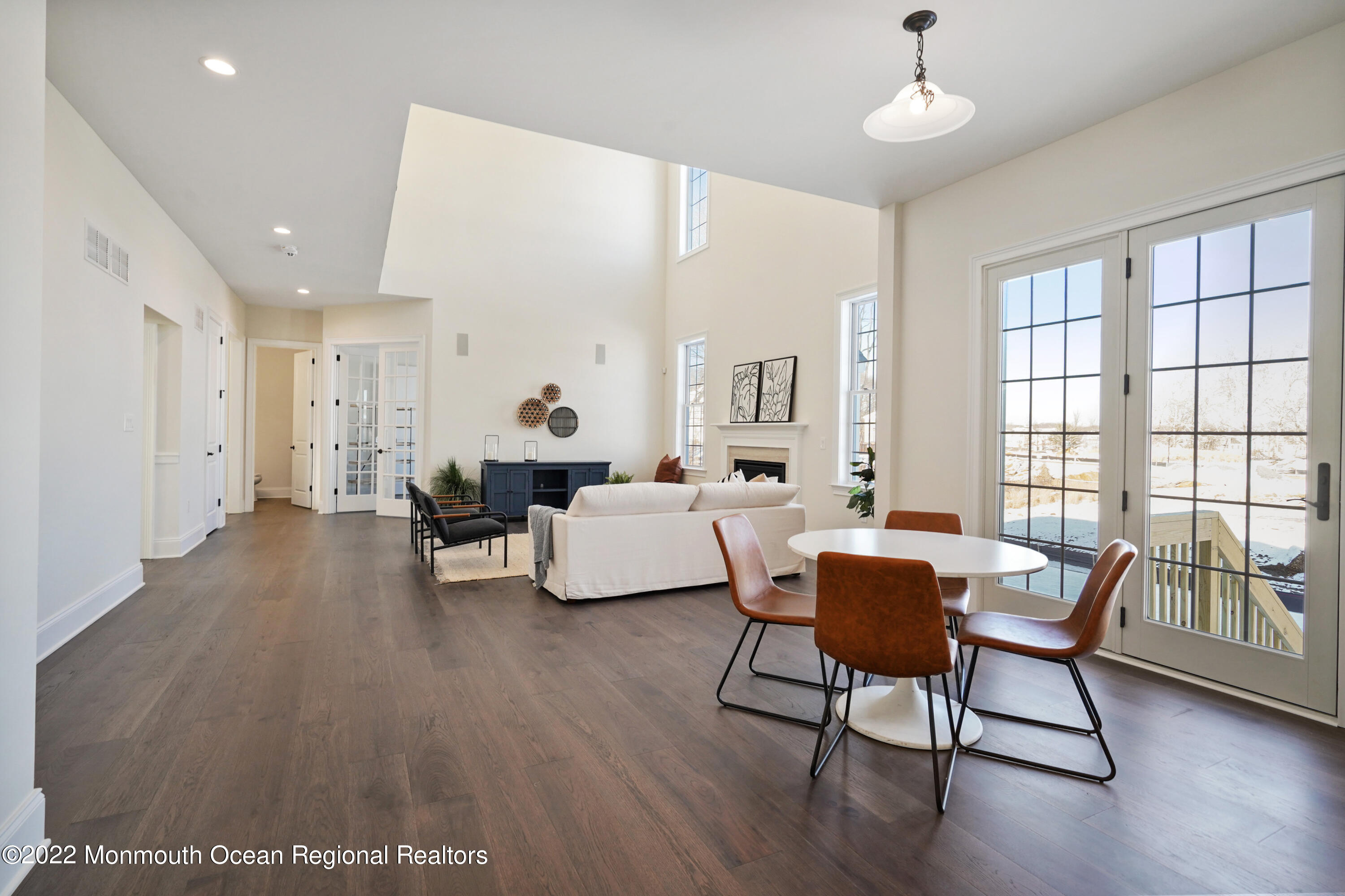 66 Windermere Road Lincroft, NJ 07738 - Photo 20 of 61 a living room with furniture and a large window