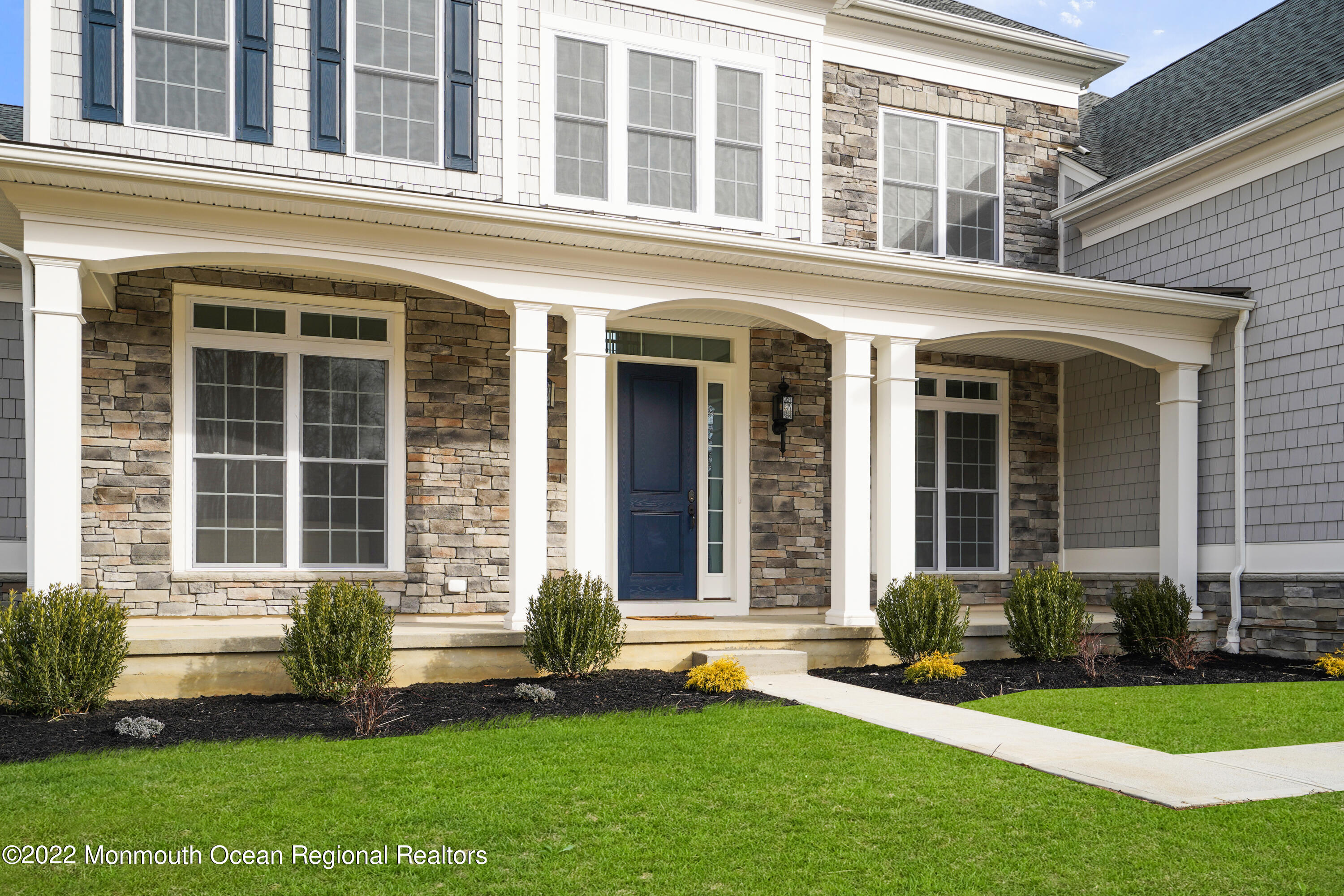 66 Windermere Road Lincroft, NJ 07738 - Photo 3 of 61 front view of a house with a yard