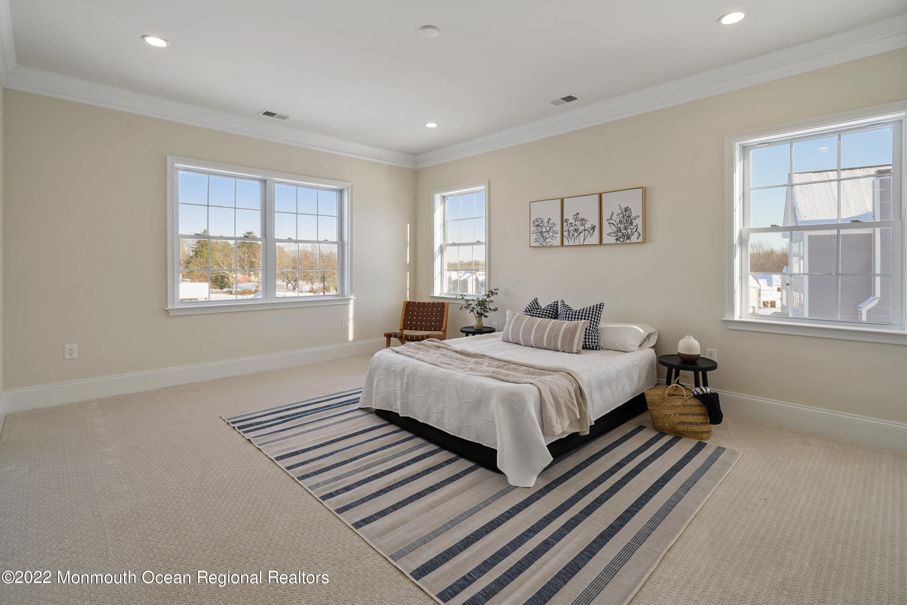 66 Windermere Road Lincroft, NJ 07738 - Photo 31 of 61 a bedroom with a bed and wooden floor