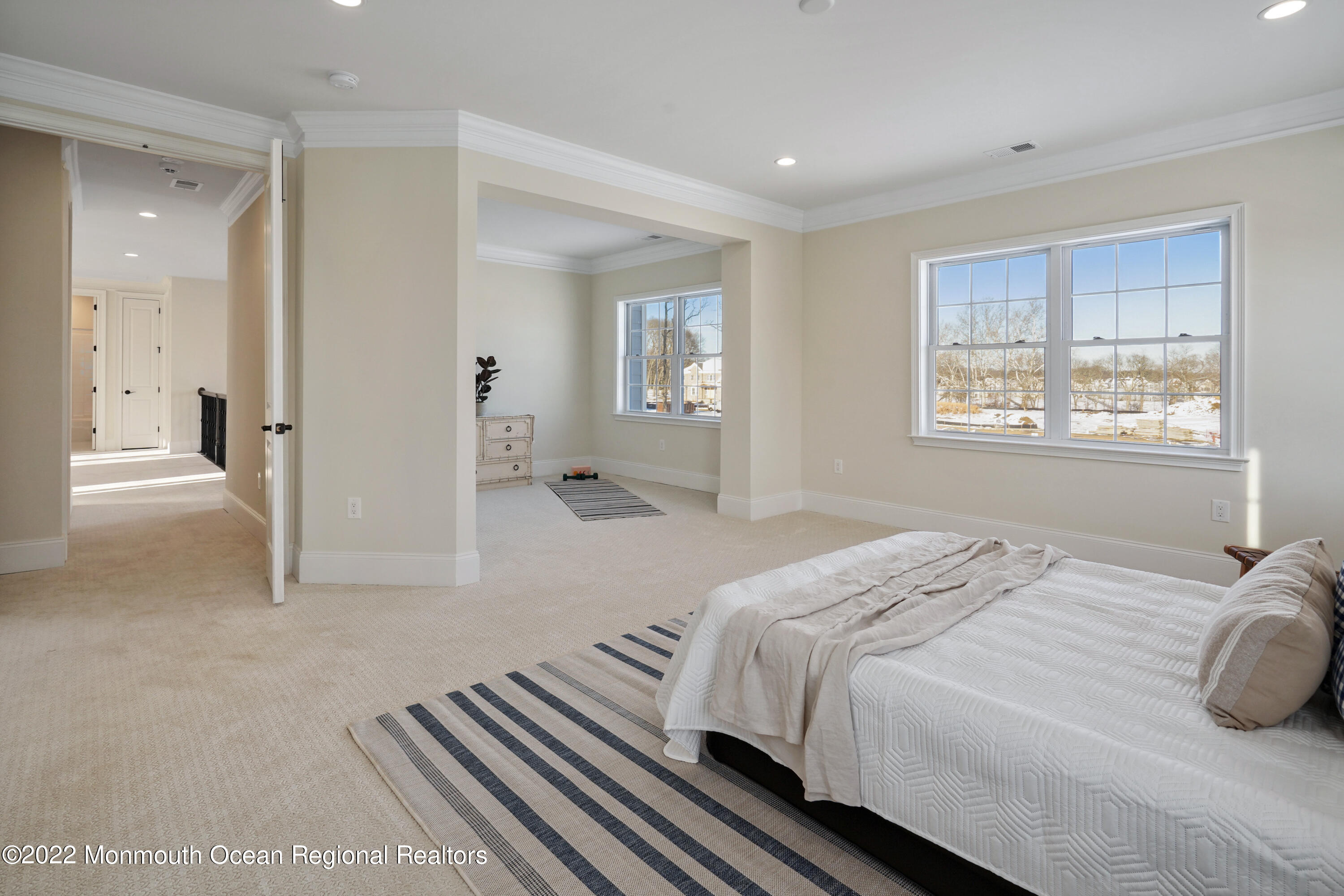 66 Windermere Road Lincroft, NJ 07738 - Photo 35 of 61 a bedroom with a bed and a large mirror