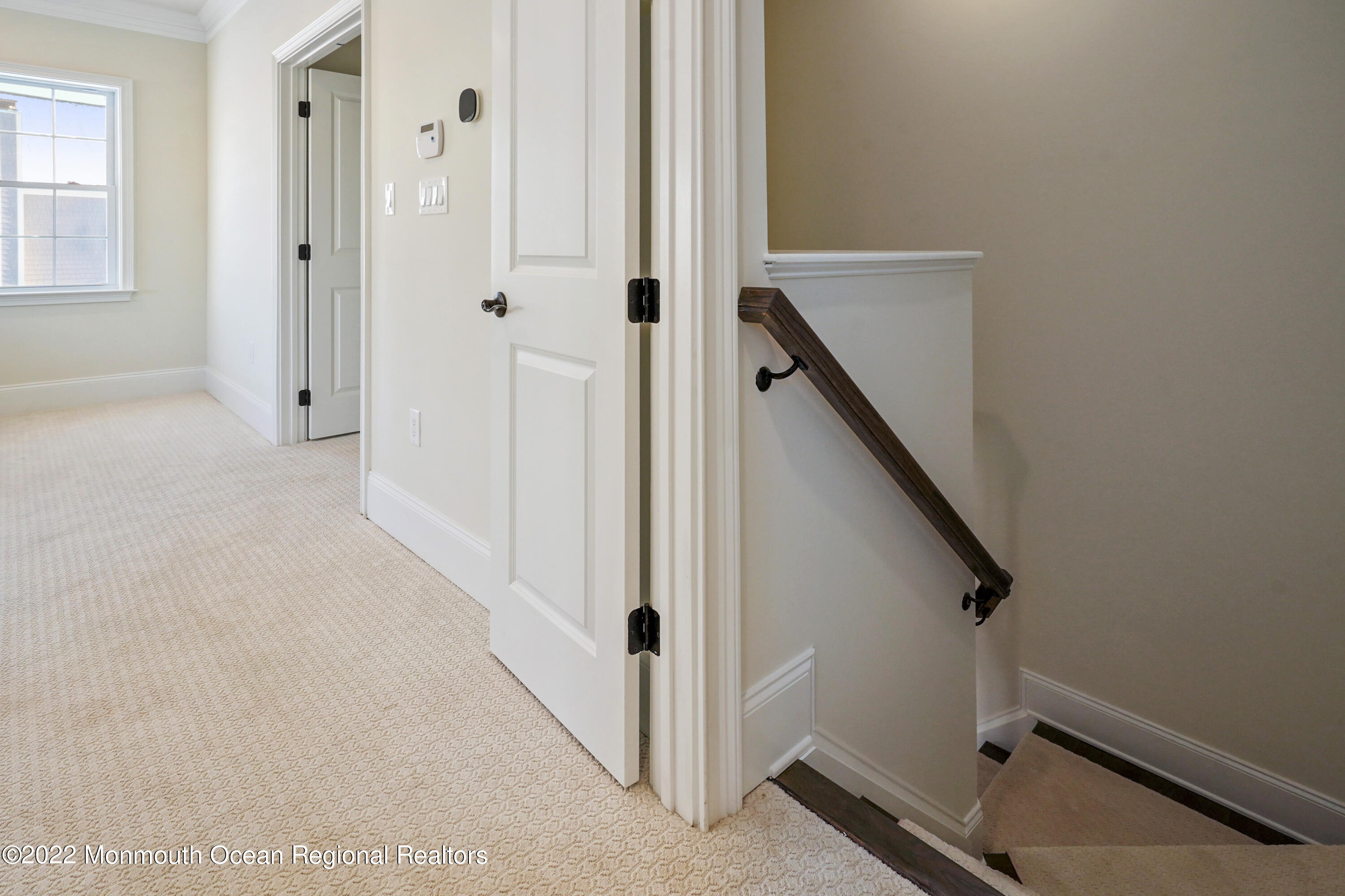 66 Windermere Road Lincroft, NJ 07738 - Photo 44 of 61 a view of a livingroom with stairs