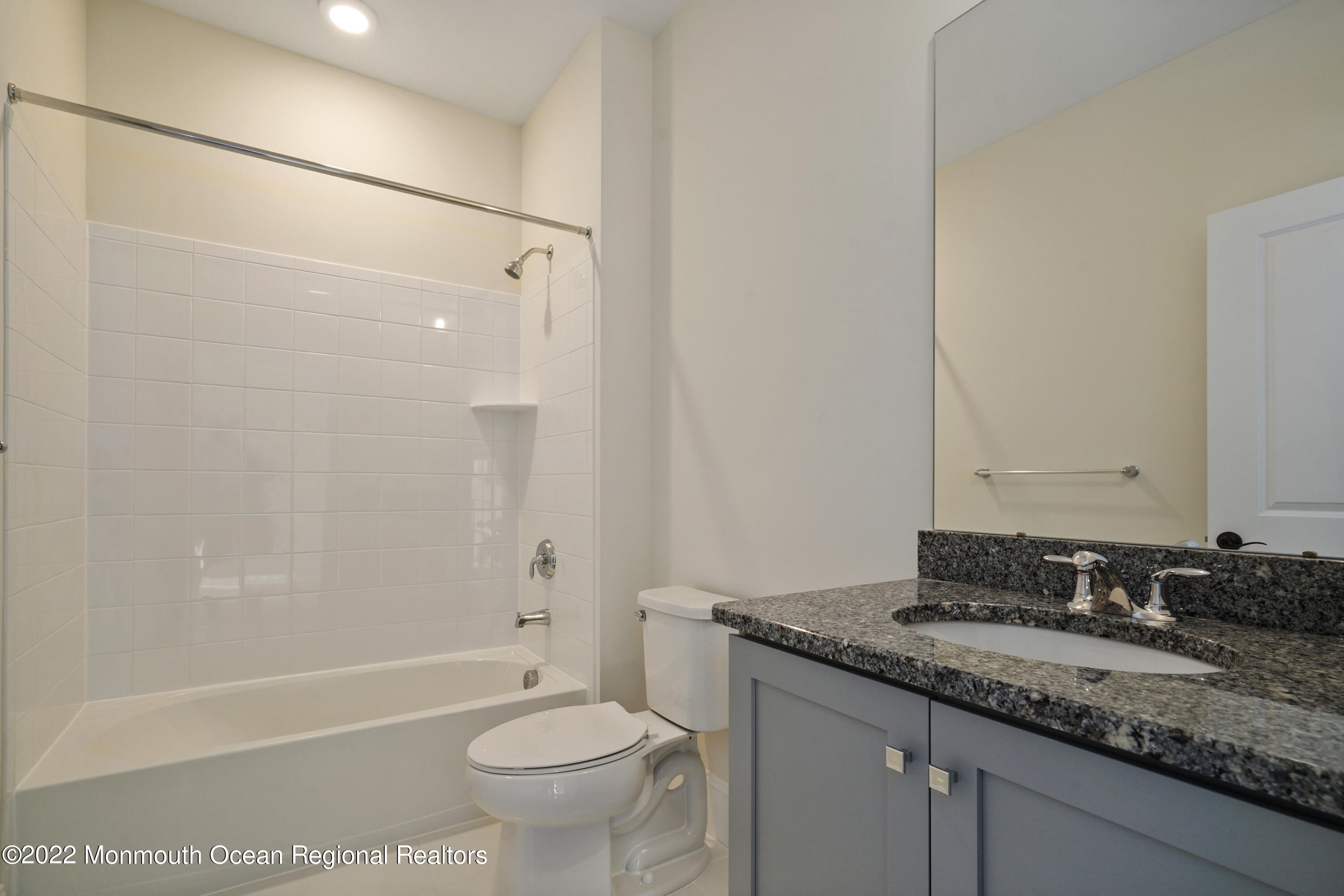 66 Windermere Road Lincroft, NJ 07738 - Photo 49 of 61 a bathroom with a granite countertop sink toilet and shower