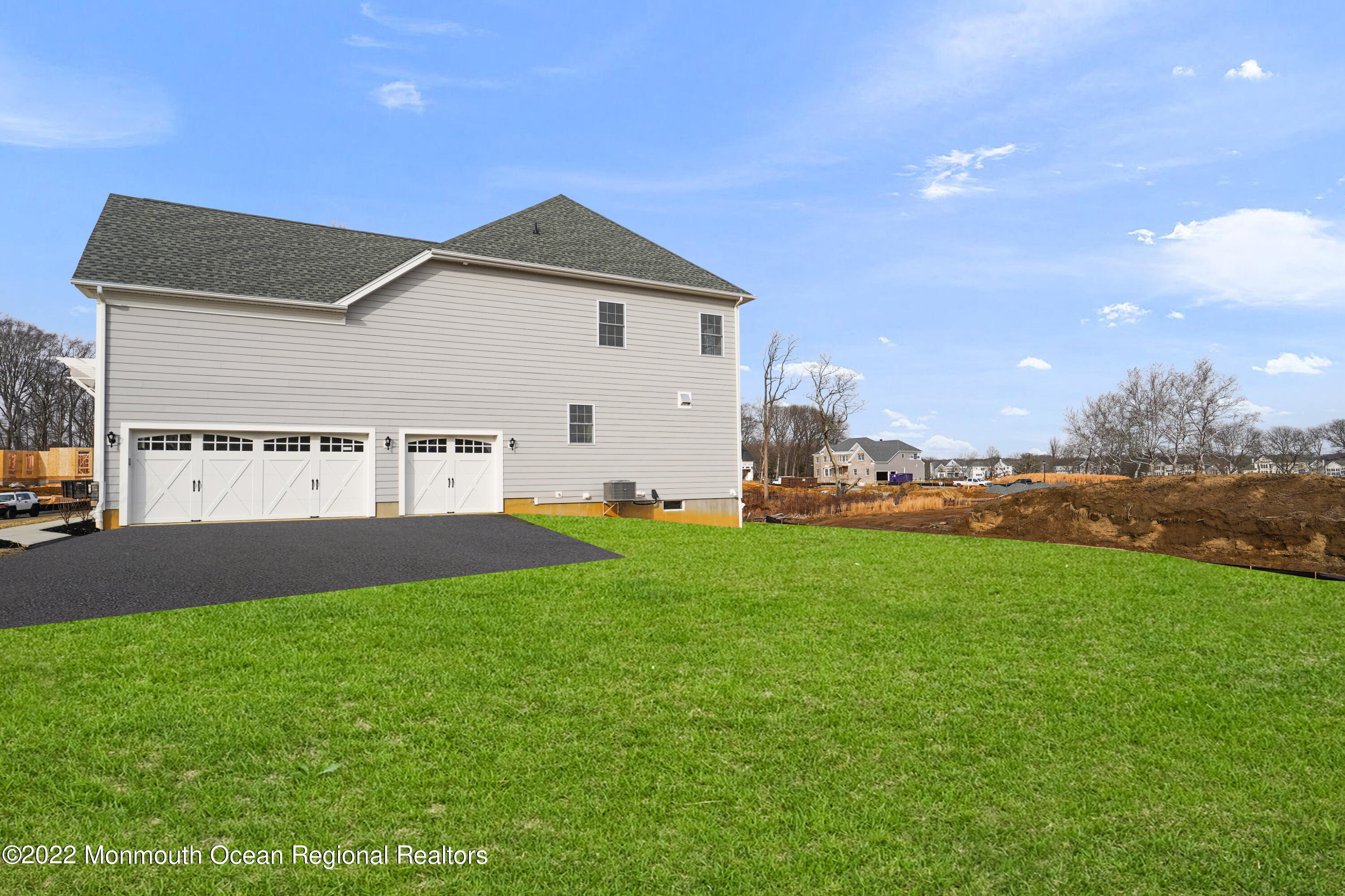 66 Windermere Road Lincroft, NJ 07738 - Photo 53 of 61 a view of a house with a yard