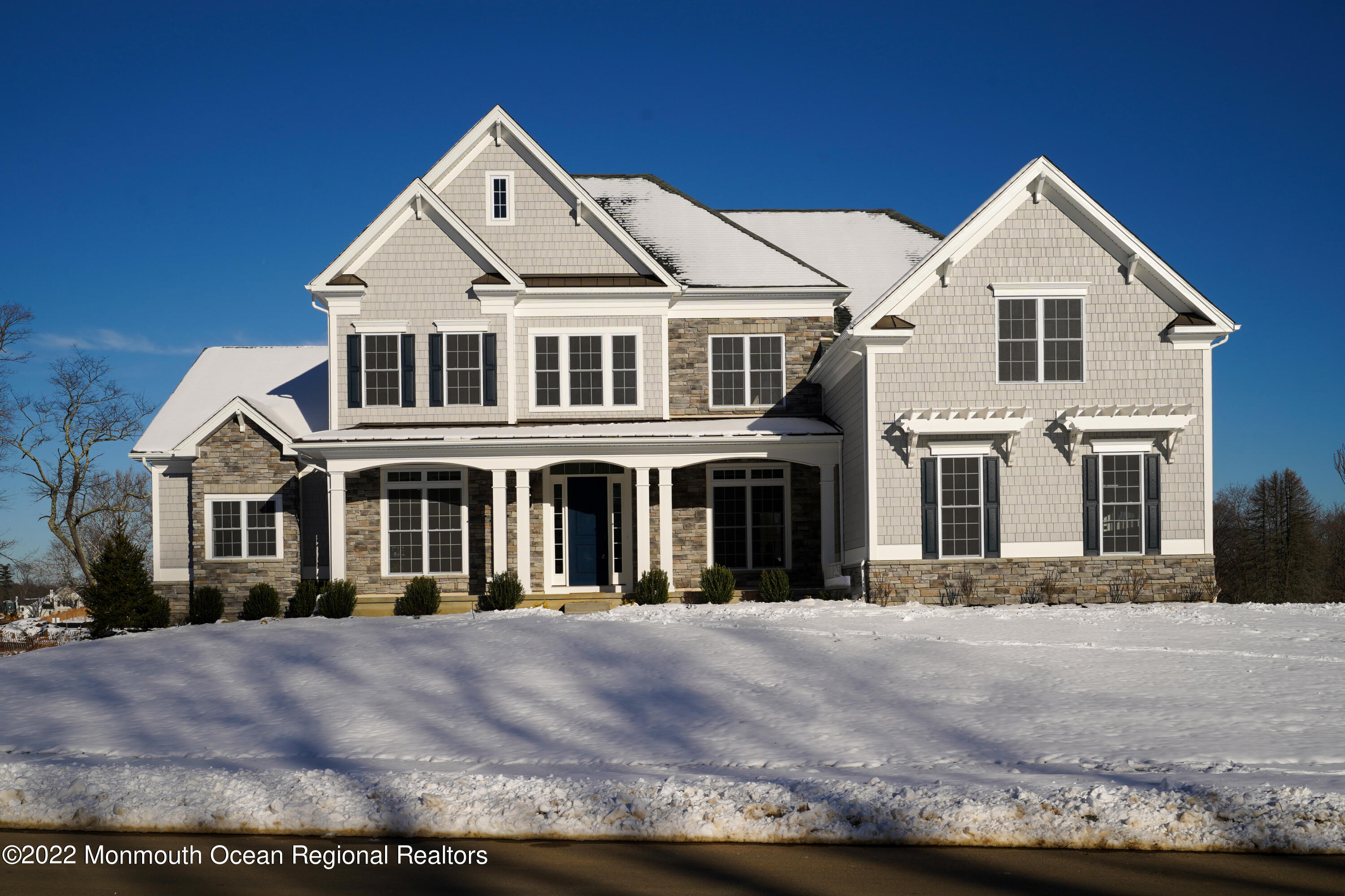 66 Windermere Road Lincroft, NJ 07738 - Photo 59 of 61 a front view of a house with a yard