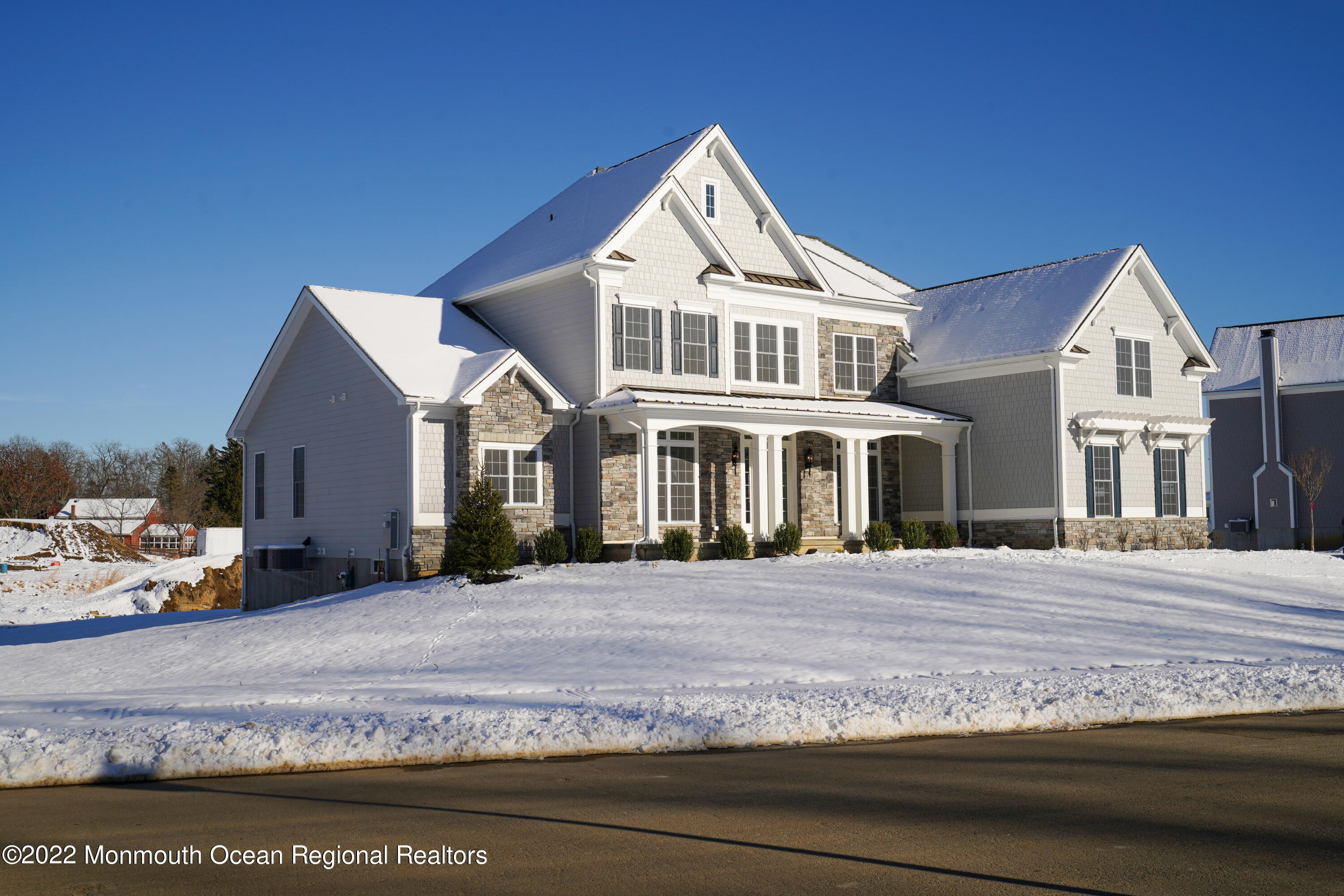 66 Windermere Road Lincroft, NJ 07738 - Photo 60 of 61 a front view of a house with a yard