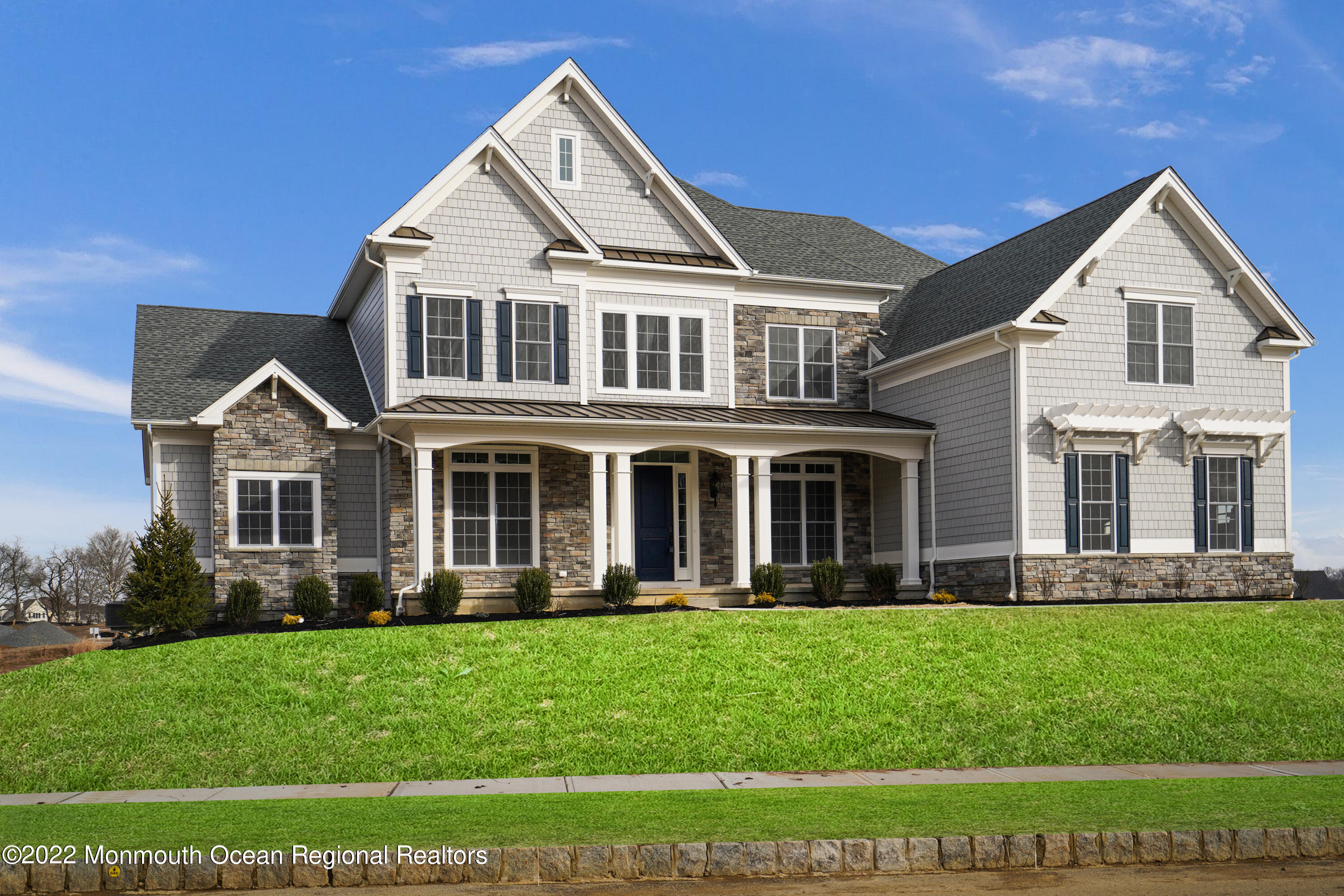 66 Windermere Road Lincroft, NJ 07738 - Photo 61 of 61 a front view of a house with a yard
