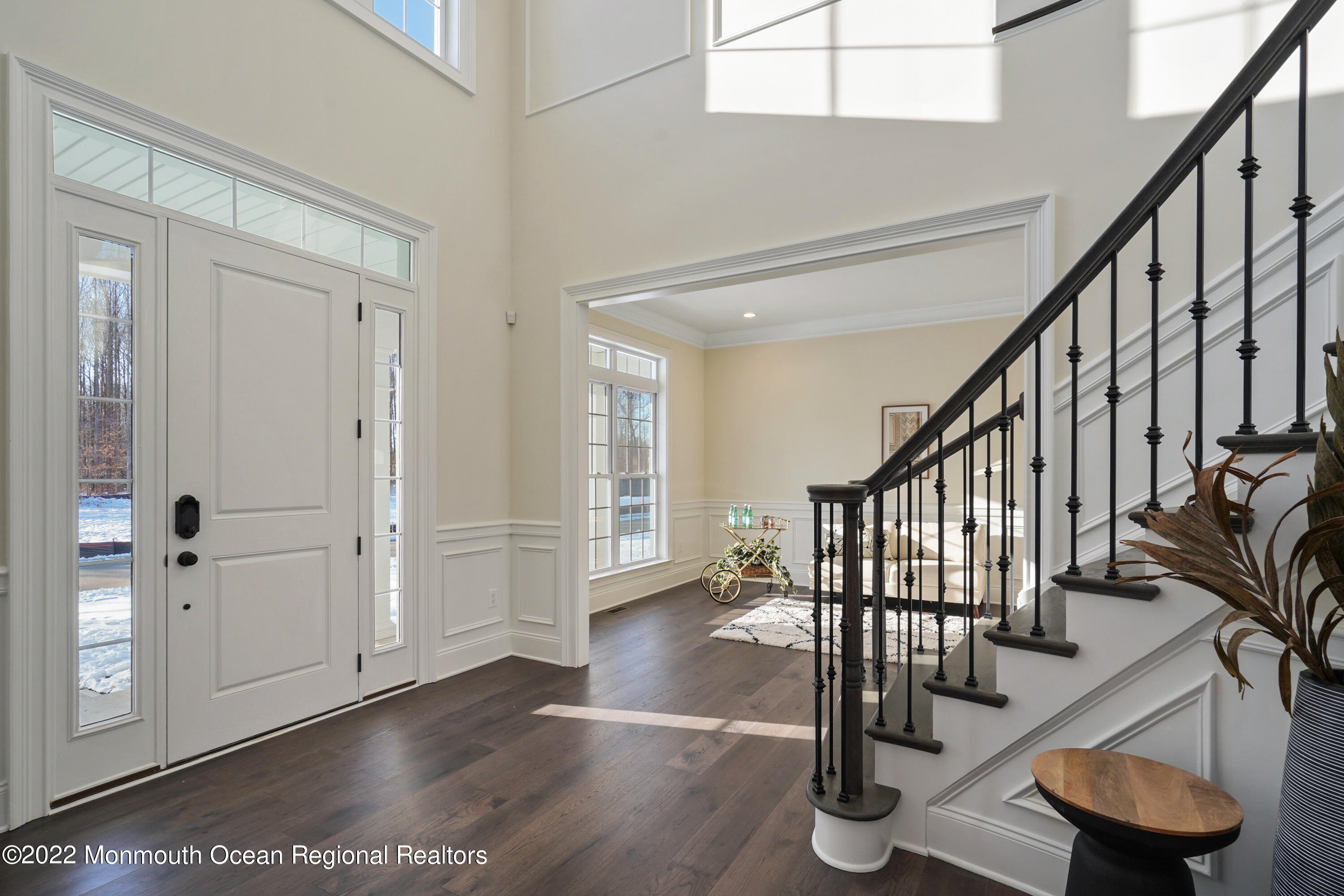 66 Windermere Road Lincroft, NJ 07738 - Photo 7 of 61 a view of entryway with wooden floor and stairs